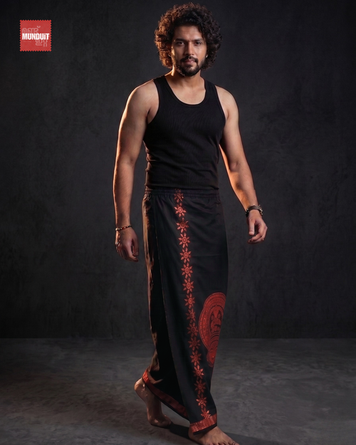 Kathakali Edition mundu in black and red by Mundu It! — elastic-waist mundu with woven Kathakali face border